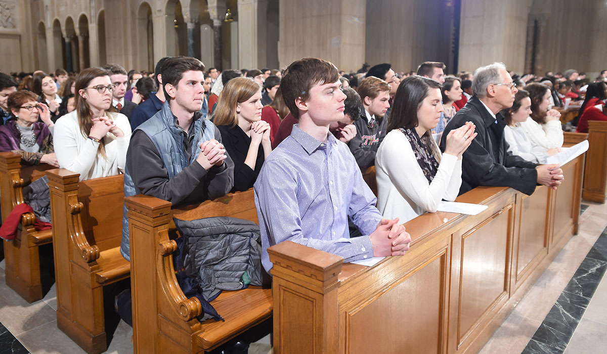 Students at Aquinas Mass